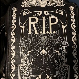 Glow in the dark tombstone backpack